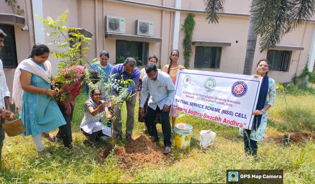 Volunteers planting a tree